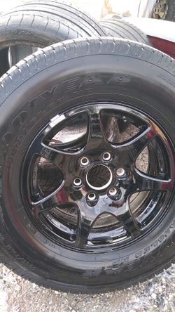 Brand New Chevy truck Aluminum sport rim and tire Both never been put on .265/70 R. 17Goodyear