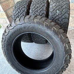 BF Goodrich 275/65/20 All Terrain Tires.