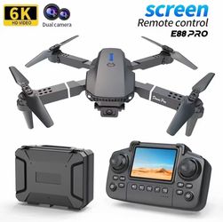Brand New E88 Pro Foldable Drone with accessories and carrying case