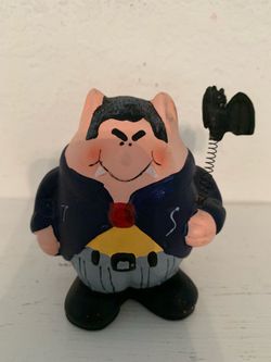 Cartoon Pig Vampire Figurine with Spring Tail