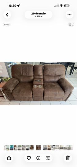 Brown Reclining Loveseat with Center Console & Cup Holders