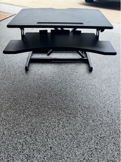 Rising desk