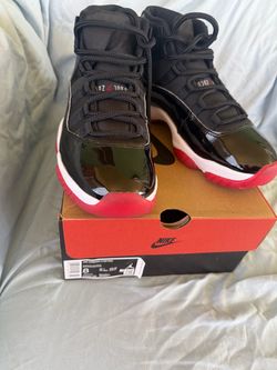 Air Jordan 11 black/ red size 8