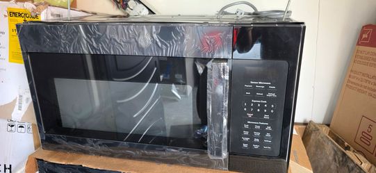NEW GE MICROWAVE 30 IN OVER THE RANGE IN BLACK