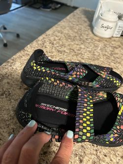 Woman’s Sketchers ( All size 9)