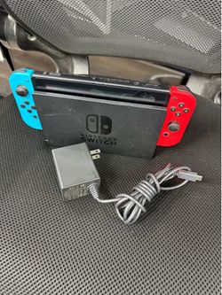Nintendo Switch with Red/Blue Joycons, Docking Station and Power Cord