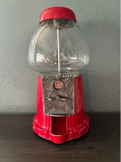Vintage Carousel Gumball Machine.  15” Red Metal. Pre Owned. Nice Condition.
