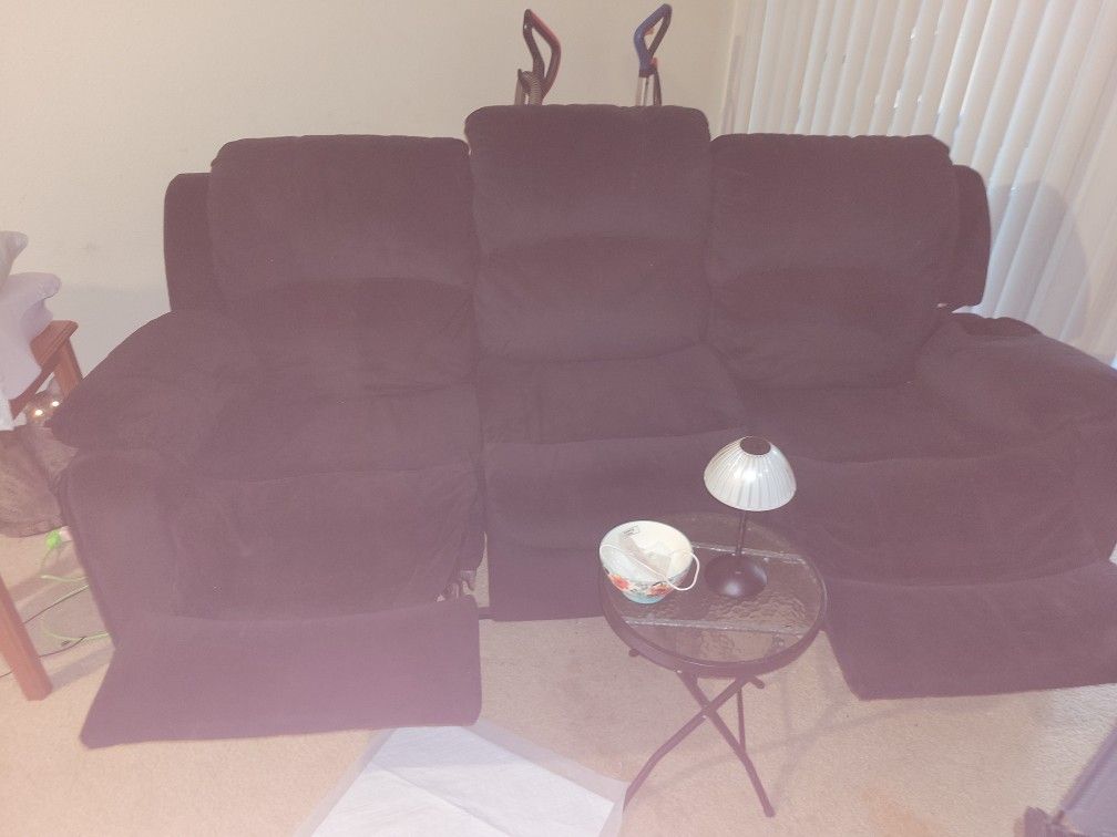 BLACK 3 SEAT RECINING SOFA FREE MUST BE PICKED UP ASAP 2 OR MORE PEOPLE NEEDED TO TAKE IT OUT MUST PICK UP ASAP.