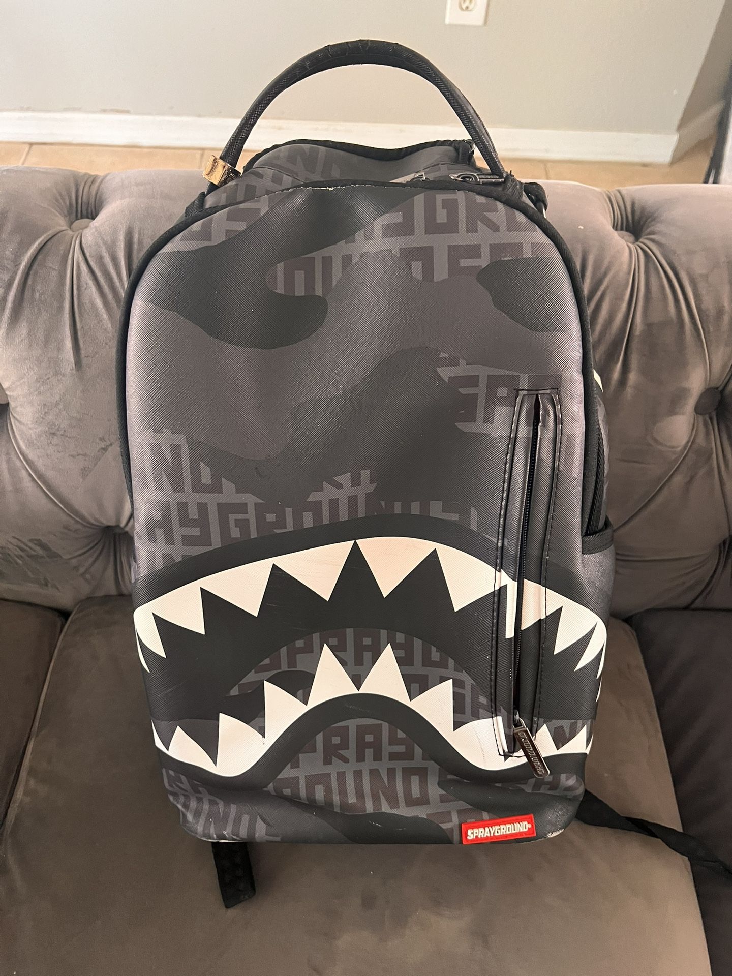 Black Sprayground Backpack