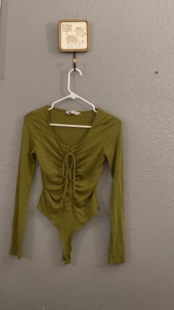 Green women’s long sleeve onesie shirt