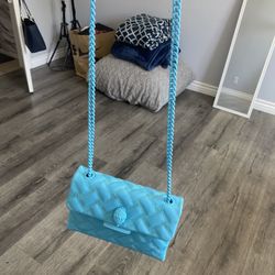 blue kurt geiger medium sized cross body purse 