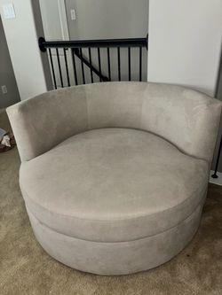 Living Spaces Swivel Couch
