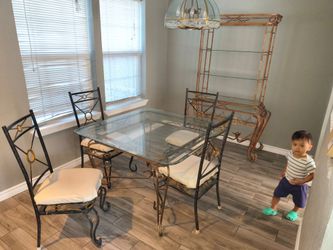 Glass Top Dining Table with 4 Chairs and shelves