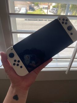 New Nintendo OLED used a few times $ 300 or best offer