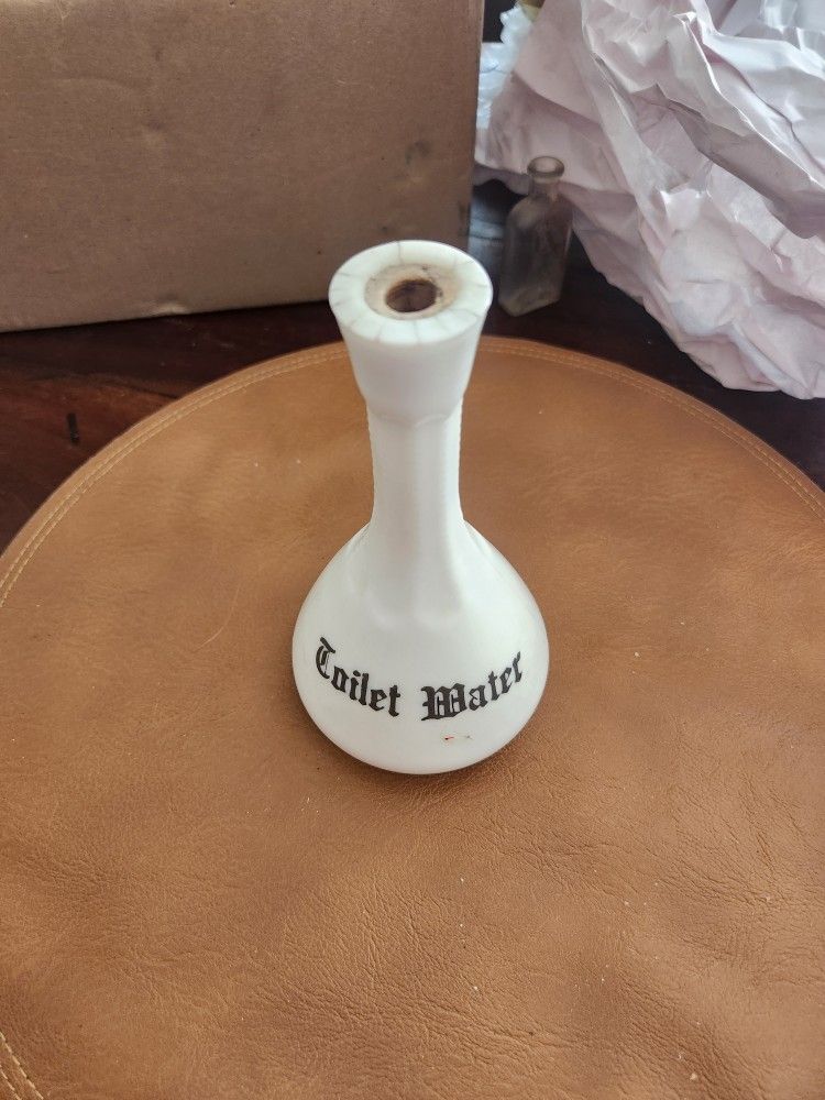 Antique Toilet Water Bottle 