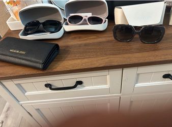 Michael Kors purse and sunglasses
