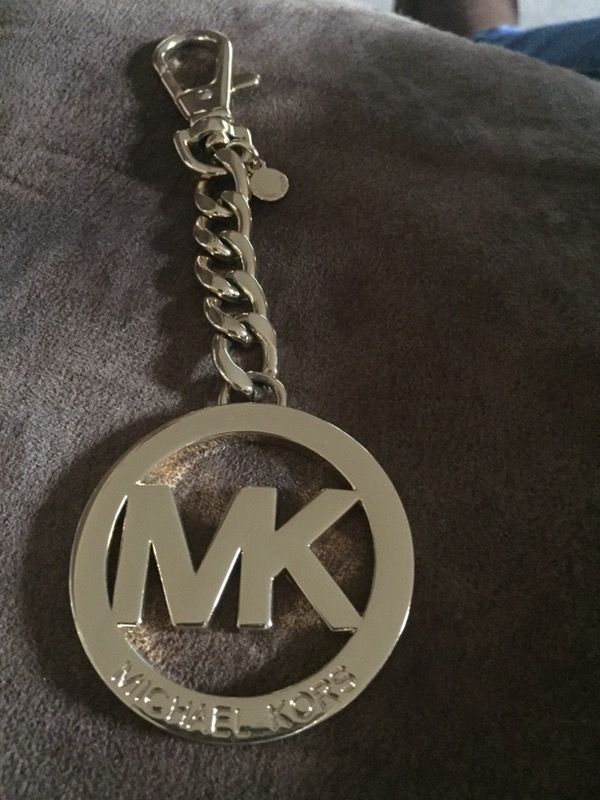 New Mk charm fob key w/o box . Gold