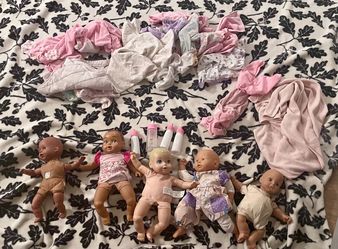 Tote full of dolls and clothes. Off Boxelder dr 92563