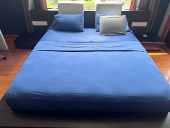 King size wooden bed with side lights