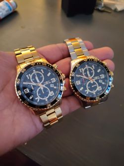 $125 FOR BOTH MEN'S INVICTA