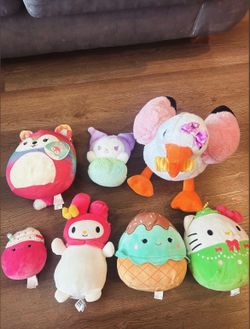 7 plushies 3 hello kitty ones 4 squish-mellow brand plushies one still with tag I take any offers
