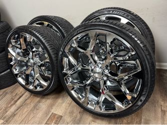 NEW 26 inch chrome snowflake wheels wrapped in lexani 305/30r26 tires.