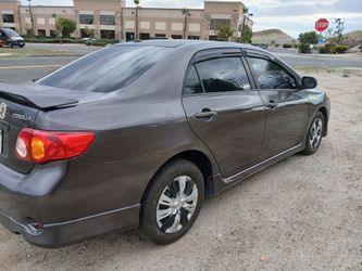 2009 TOYOTA COROLLA 4 CYLR 5 SPEED 132K RUINING GOOD