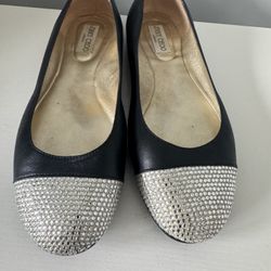Jimmy Choo black leather ballet flats with a crystal-embellished toe 