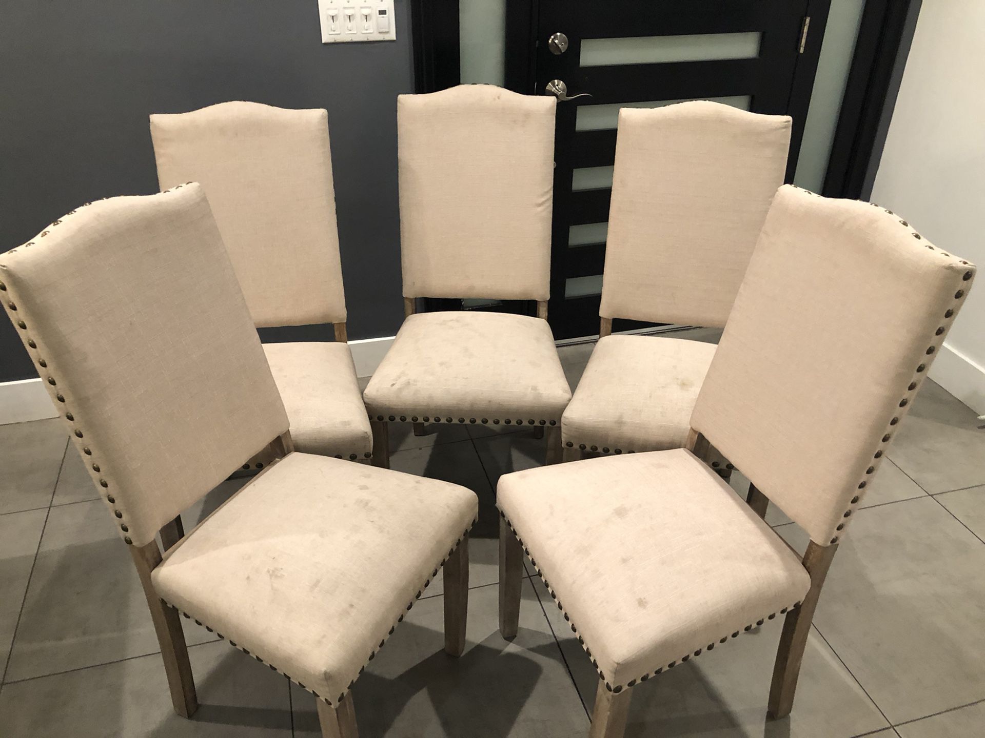 Beige and wooden cushioned Dining Chairs