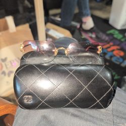 cartier gold rimless glasses