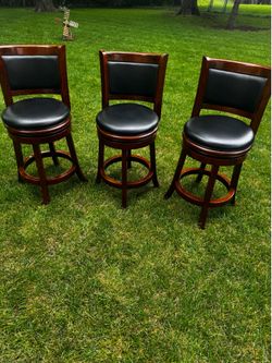 3 Counter Height Swivel Stools