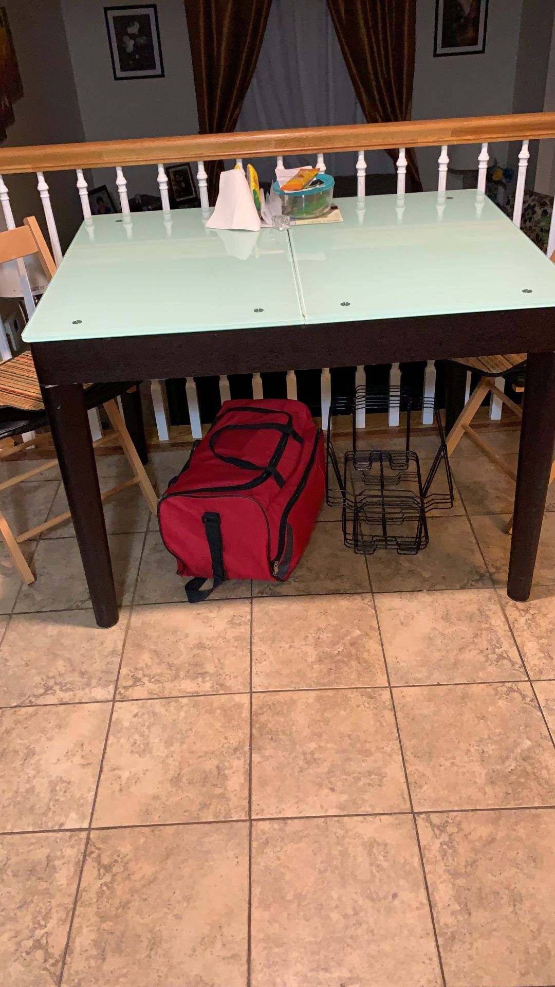 Dining table with glass not chairs.