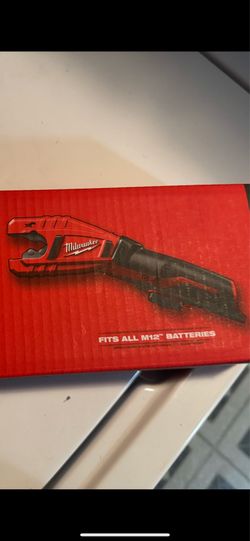 New Milwaukee M12 -12V Lithium-lon Cordless copper tubing cutter tool with charger and  one battery still in box .