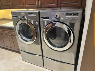 LG Front-Load Washer and Dryer Set with Pedestals