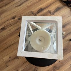 Candle Holder With A Candle Inside 