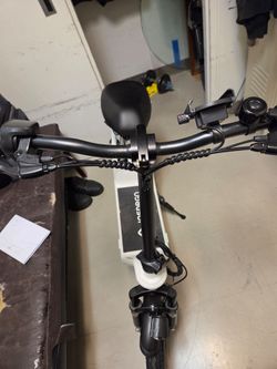 E scooter with a seat