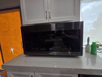 Used samsung 1000 watt above stove microwave