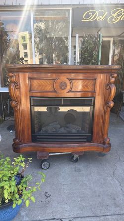 Beautiful solid wood fireplace with Heat