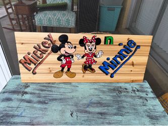 Hand painted Mickey Mouse sign on wood by local artist