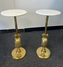 Two gold pineapple end tables