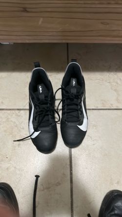 Nike cleats black and white