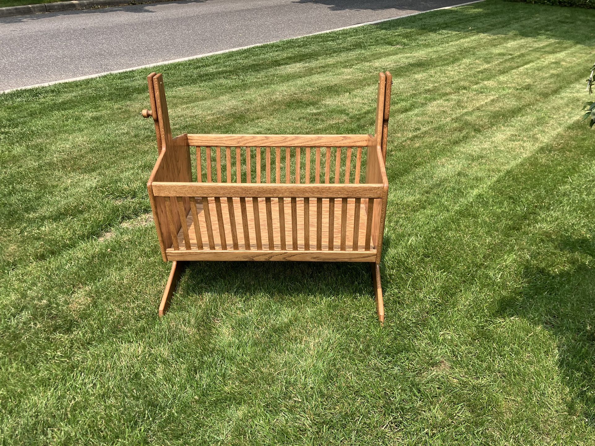 Babies oak rocking crib, great condition