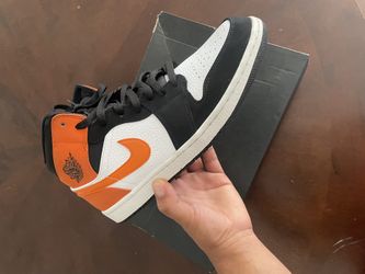 Jordan 1 mid (Orange)