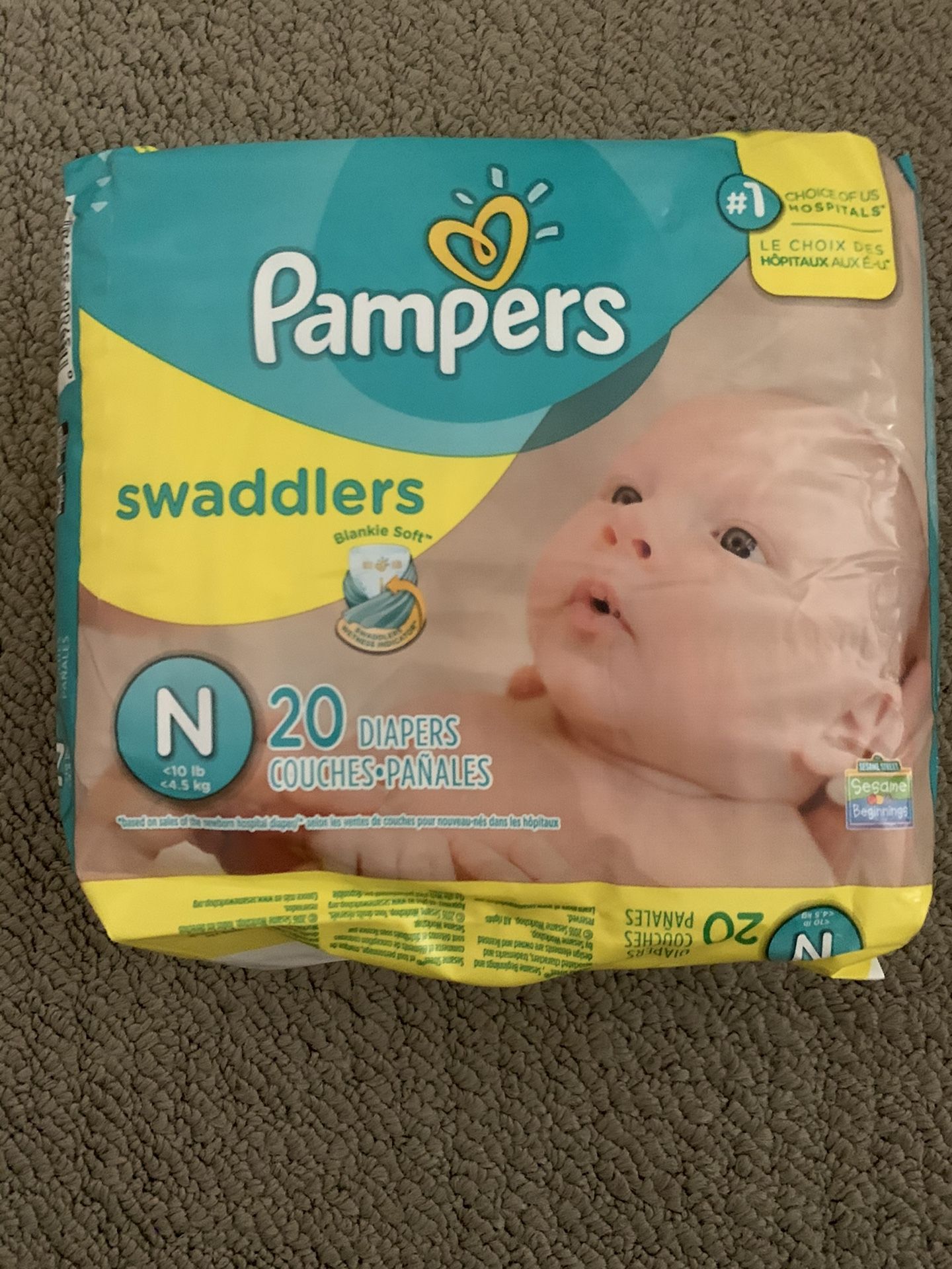 Brand new pampers swaddler newborn size diapers