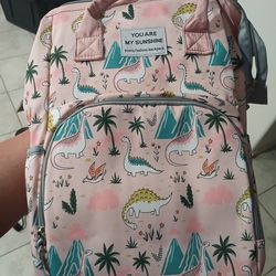 Pink dinosaur diaper bag