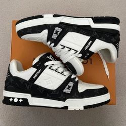 Louis Vuitton LV Trainer sneakers in a black and white monogram-embossed calf leather