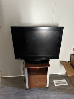 T V