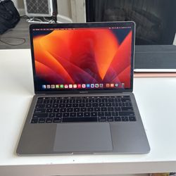 MacBook Pro w/ Touch Bar
