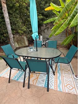 6 chairs and glass table