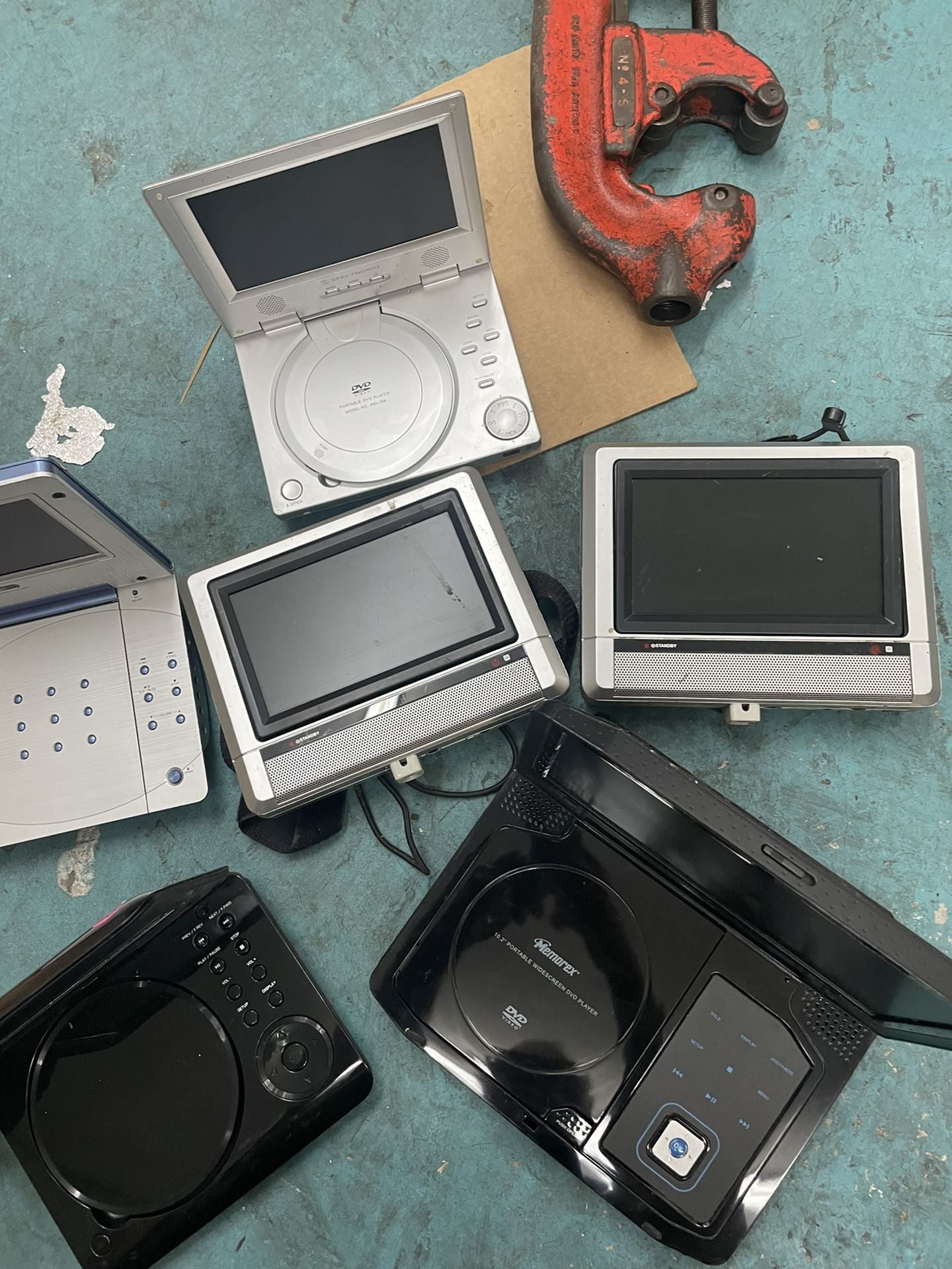 Box of seven portable DVD players